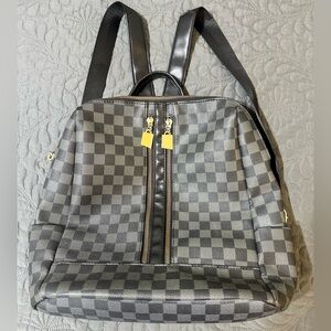 Stylish Gray and Black Backpack with Structured Design